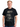 KISS Discharge Live Concert T-Shirt worn by a man, featuring an iconic band graphic in black and white.