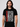 Iron Maiden Eponymous Face Red Logo T-Shirt worn by a man, featuring the iconic face design.