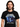 Metallica Ride The Lightning t-shirt featuring iconic album art on a black t-shirt worn by a man.