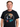 Man wearing Styx US Tour 79 Vintage Black T-Shirt featuring colorful graphics and band logo.