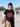 Smashing Pumpkins Star Logo Tee worn by a young man holding a skateboard in a skate park.