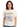 Woman wearing Woodstock Wild Flowers Natural T-Shirt featuring colorful floral design inspired by Woodstock festival.