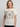 Woodstock Butterfly Vintage T-Shirt featuring butterfly artwork on a unisex T-shirt worn by a woman.
